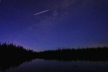 shooting star in night sky
