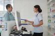© snowing12 - Medicine and health concept, Pharmacist sell medicine product and explain take medicine to client