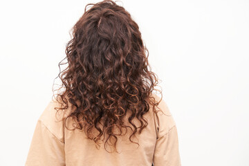 Natural curls with coloring Moisturized healthy curly hair after visiting the salon. Curly method product used