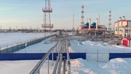 The drone flies over the gas pipeline that is needed to generate electricity at the gas turbine power plant, in winter, gas consumption increases due to cooling. Fuel crisis in Europe and the USA.