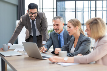 Poster - Group of business partners discussing ideas and planning work in office.