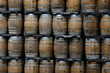 Wooden barrels stacked on pallets, Spanish wine barrel, oak