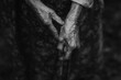 Close-up hands of an old woman.
