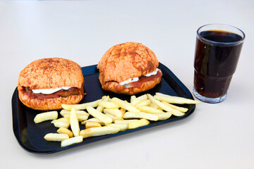 Big tasty burger with beef cutlet on a plate. Crispy chicken burger.