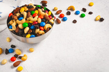 Classic Trail Mix In A Bowl On A Light And Airy Background With