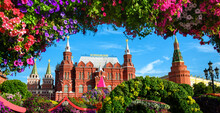 Flowers On Manezhnaya Square, Moscow, Russia. Historical Museum (it's Written On Roof) And Moscow Kremlin In Background