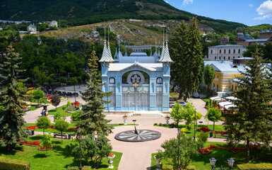 Wall Mural - Park Flower Garden in Pyatigorsk, Russia. Scenic view of Lermontov Gallery, historical landmark installed in 1901