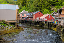 A Close Up View Of Stilted Buildings In The Creek In Ketchikan, Alaska In Summertime