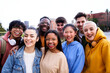 © CarlosBarquero - Portrait multiracial group of friends smiling looking at camera. Happy young people having fun