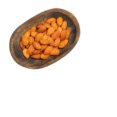 Wall Mural - Prunus dulcis - Organic peeled almonds in the wooden bowl