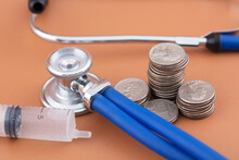 Stethoscope And Some Dollar Coins