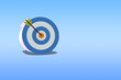 © WS Studio 1985 - 3D rendering of a target board on a blue background with copy space for focusing on business objectives.