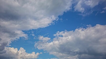 Wall Mural - Beautiful Cloudscape Slowly Moving On Blue Clear Sky. Timelapse