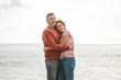 © Westend61 - Loving mature couple hugging each other at beach on vacation