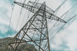 © Westend61 - High voltage electricity tower in front of sky