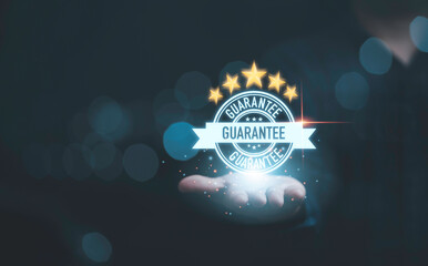 Fototapete - Businessman holding and showing the best quality assurance with golden five stars for guarantee product and ISO service concept.