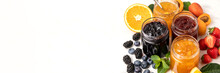 Banner Homemade Jam In Glass Jars On A White Background, Strawberry Jam, Apricot Jam, Orange Jam, Blueberries And Blackberries