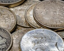 Closeup Shot Of A Stack Of United States Peace And Morgan Silver Dollars