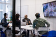 © ReeldealHD images - Businesspeople having a video conference in an office