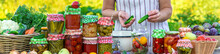 Woman With Jar Preserved Vegetables For Winter. Selective Focus.