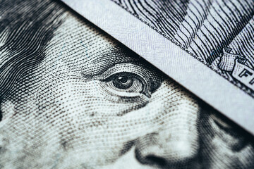 Wall Mural - Macro face and eyes of a hundred dollar bill. Money and finance concept.