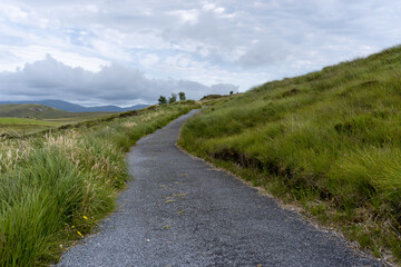 Sticker - landscape of hiking trail leading through the meadows and hills of the Ballycroy National Park in County Mayo