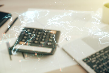 Poster - Abstract creative digital world map on blurry calculator and computer background, globalization concept. Multiexposure