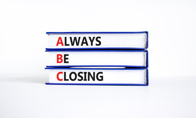 abc always be closing symbol. concept words abc always be closing on books on a beautiful white tabl