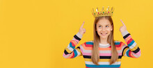 Happy Teen Kid Point Finger On Queen Crown On Yellow Background. Child Queen Princess In Crown Horizontal Poster Design. Banner Header, Copy Space.