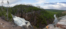 Waterfall In The American Landscape. Gibbon Falls In Yellowstone National Park, Wyoming. United States. Cloudy Sky Art Render. Nature Background Panorama
