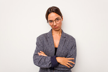 Wall Mural - Young hispanic woman isolated on white background who is bored, fatigued and need a relax day.