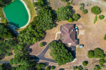 Wall Mural - looking down at a home in the countryside