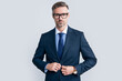 © be free - serious mature businessman in businesslike suit and glasses