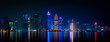 © MSM - Doha skyline with many towers during the night.