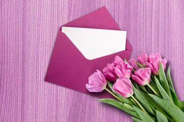 Wall Mural - Fresh tulips, envelope with blank sheet. Valentine's Day, Mother's Day holiday concept.