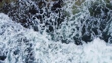Drone View Overhead Stock Video Of Waves Hitting The Sand