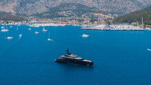 Drone View Of A Black Super Yacht In Turkish Marina
