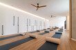 © Bisual Studio/Stocksy - Spacious yoga studio with mats and rolls