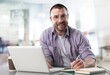 © BillionPhotos.com - Happy satisfied millennial man using laptop at office workplace, working, thinking, watching online webinar, training, making payment