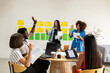 © Valentina Barreto/Stocksy - Multiracial business group meeting in office