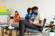 © Valentina Barreto/Stocksy - Business people at cowork office rest area