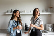 © Valentina Barreto/Stocksy - Businesswomen at office kitchen