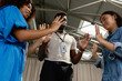 © Valentina Barreto/Stocksy - Businesspeople joined with thread