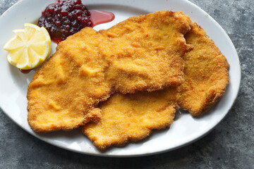 Wall Mural - golden breaded german schnitzel