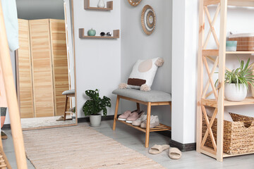 Poster - Hallway interior with shoe storage bench and floor mirror