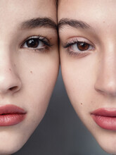 Close-up Portrait Of The Faces Of Two Young Female Models