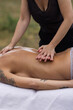 © Javier Pardina/Stocksy - Outdoor Massage