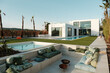 © Malquerida Studio/Stocksy - Terrace with swimming pool in luxury villa