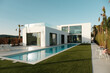 © Malquerida Studio/Stocksy - Luxury design house with pool