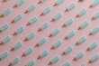 © Davide Illini/Stocksy - Colorful Ice cream popsicle pattern on pastel pink background.